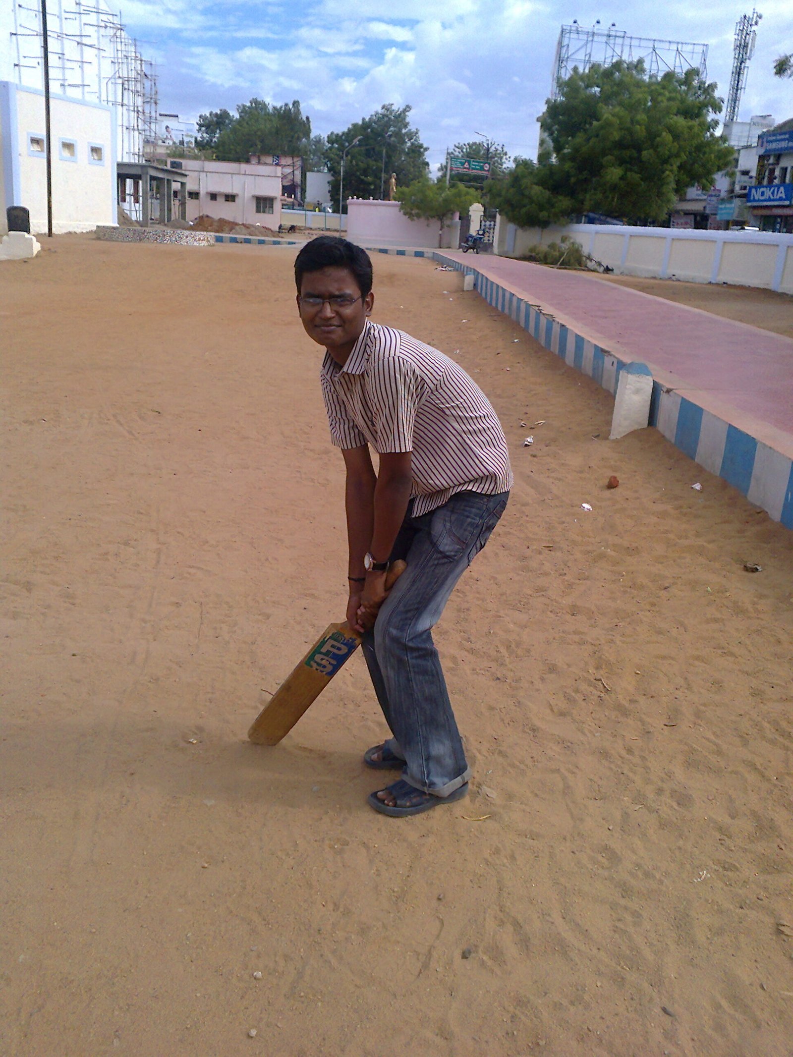 Cricket batsman batting in a match