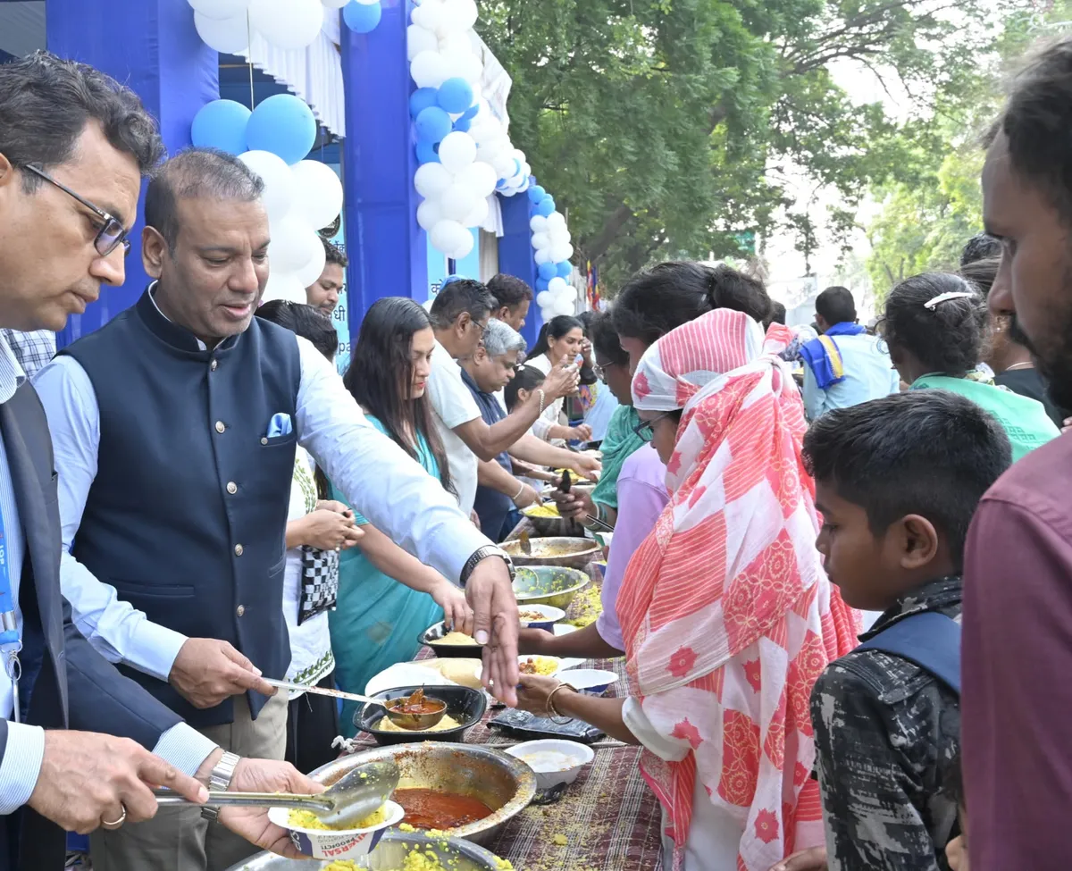 re-KYC: RBI Nagpur officials serve refreshments to visitors at the RBI stall at Deekshabhoomi, Nagpur