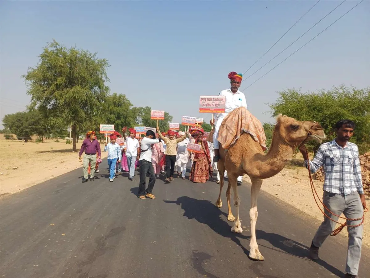 A camel and turbaned villagers join the procession