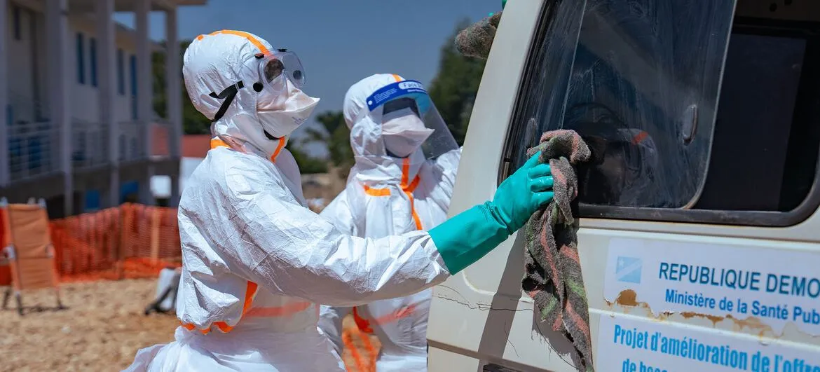 Ebola in DR Congo: Health workers disinfect a vehicle during the Ebola outbreak in eastern DR Congo